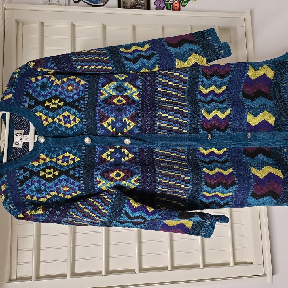 Chico's design size 2 sweater knee length. Chico sizing, one button missing